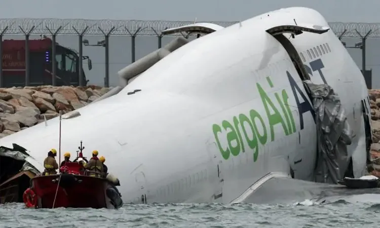 Cargo plane skids off runway into sea at Hong Kong airport