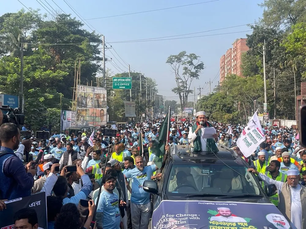 Jamaat candidate Rezaul Karim's motorcycle procession seeking votes in Lakshmipur
