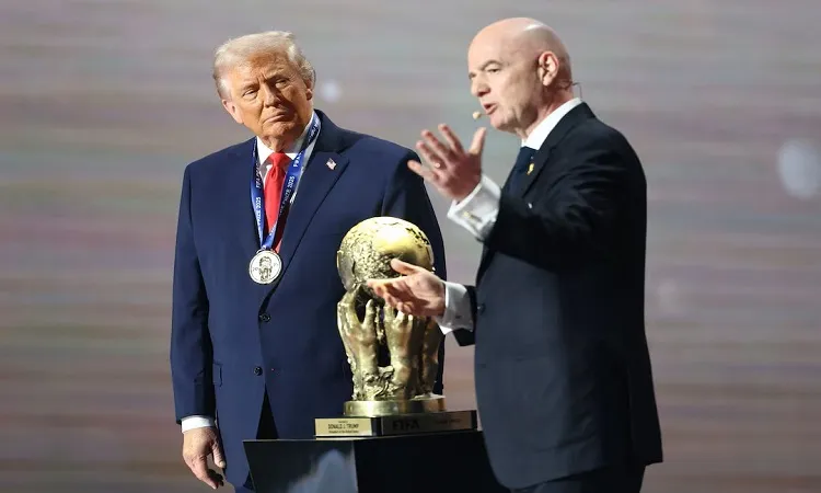 People watch as U.S. President Donald Trump draws USA during the FIFA World Cup 2026 Draw on a screen in Times Square in New York City, U.S: Photo RUETERS