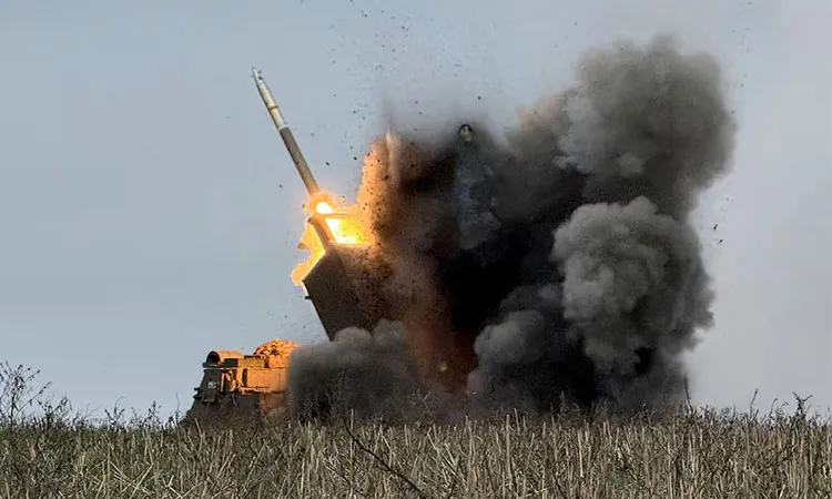 Ukrainian servicemen fire a Multiple Launch Rocket System (MLRS) towards Russian troops, amid Russia's attack on Ukraine, near the frontline town of Pokrovsk in Donetsk region, Ukraine