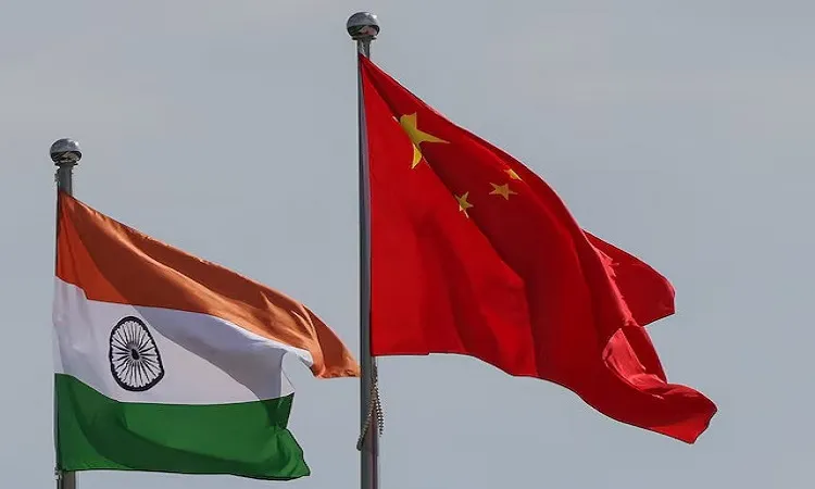 National flags of China and India fly next to the Meijiang Convention and Exhibition Center, a venue for 2025 Shanghai Cooperation Organisation (SCO) summit in Tianjin, China