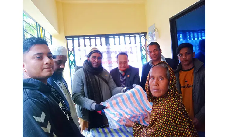 Distribution of winter clothes among the helpless and poor people in Shantiganj by Afzal Foundation