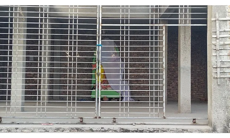 The idol of Radha-Govinda in the Ras temple in Paikgachha has been vandalized