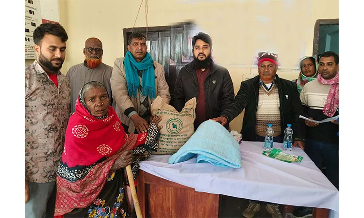 Distribution of dry food and cold clothes among the needy disabled in Porsha
