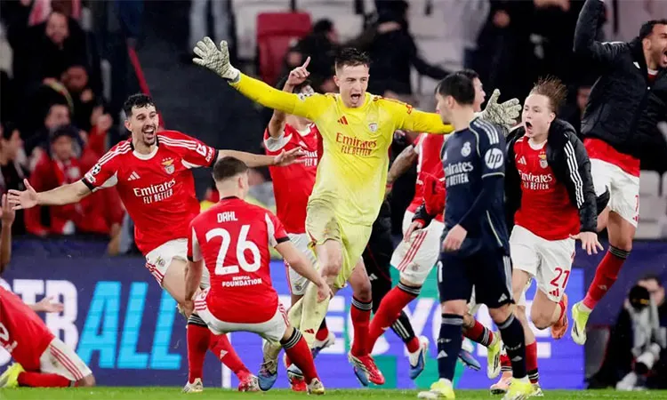 Goalkeeper Anatoly Trubin scored a last-gasp header to send Benfica through the Champions League and eliminate Real Madrid in a dramatic Lisbon night: Photo collected