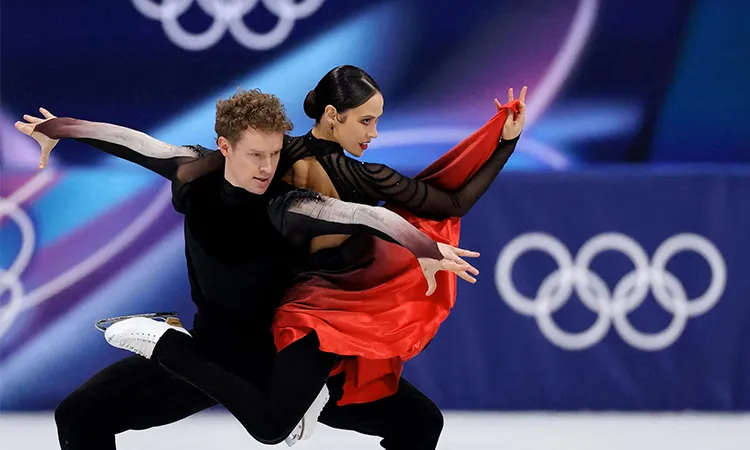 Gold medallists Laurence Fournier Beaudry of France and Guillaume Cizeron of France stand on the podium during the Ice Dance Victory Ceremony.