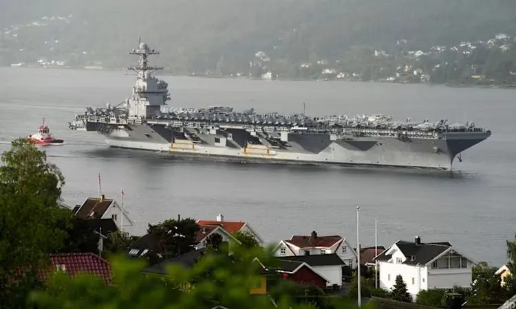 The Military preparations raise the stakes as diplomatic efforts between Washington and Tehran continue.