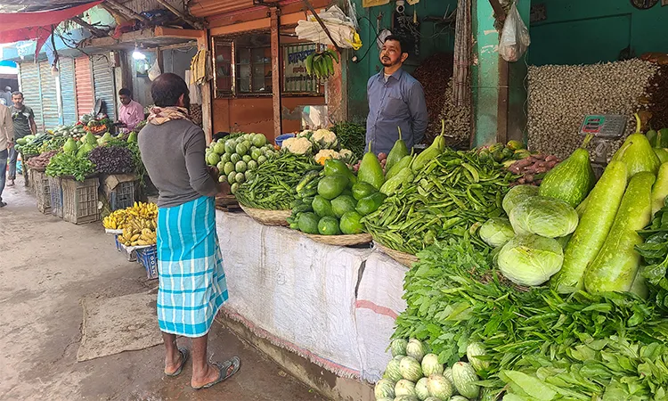 At the start of Ramadan, Phulbari market in Dinajpur saw sharp rises in prices of chicken, beef, mutton, vegetables, pulses, and dates, causing concern among buyers.