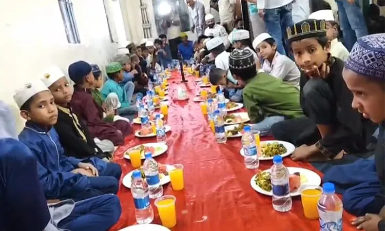 Children from orphaned and distressed families took part in the iftar.