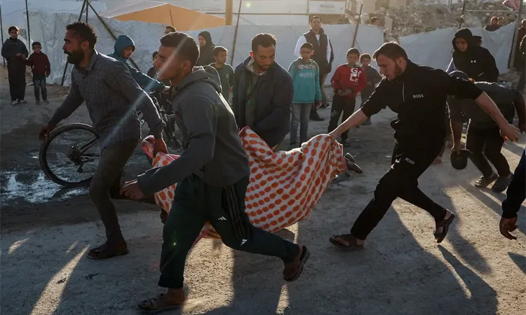 In Gaza City, an Israeli airstrike killed three men near Al-Azhar University, according to Mohamed Abu Selmia, head of Al Shifa Hospital.