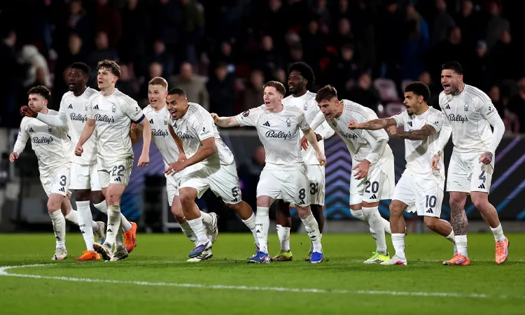The Nottingham Forest team celebrate their shootout win.