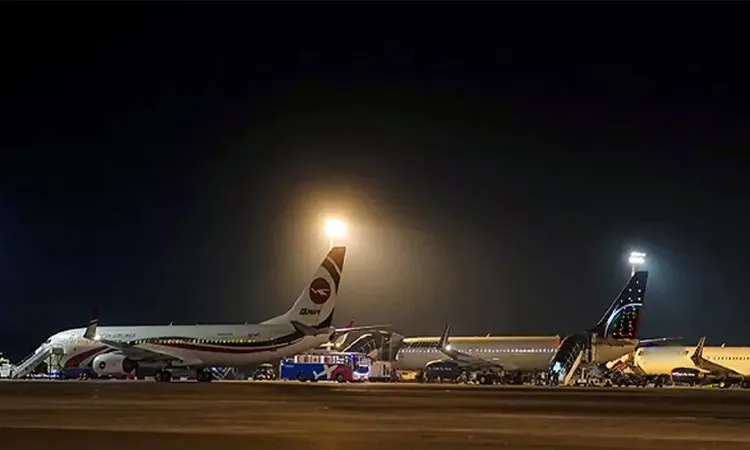 A chartered flight landing at Hazrat Shahjalal International Airport in Dhaka with 282 Bangladeshi nationals.