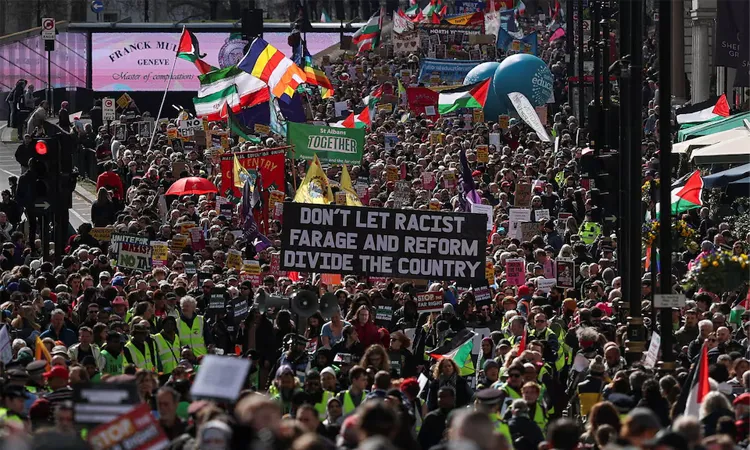 In Washington, D.C., hundreds marched from the Lincoln Memorial to the National Mall, chanting slogans like “No kings” and carrying anti-government placards.