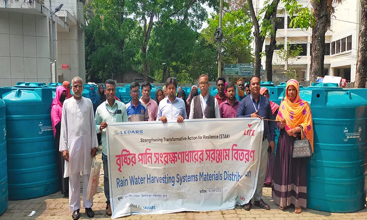 Rainwater Tanks Distributed to Poor Families in Paikgachha