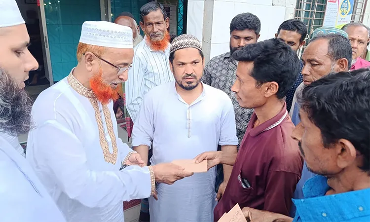 MP provides aid to fire-affected traders in Naldanga