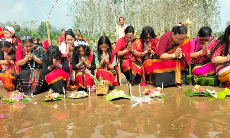 The ritual of floating flowers in the river is a core tradition practiced to seek blessings from the Goddess Ganga.