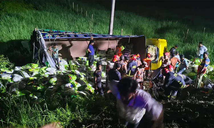 The accident involved a truck carrying rice and 13 unauthorized passengers on top of the cargo.