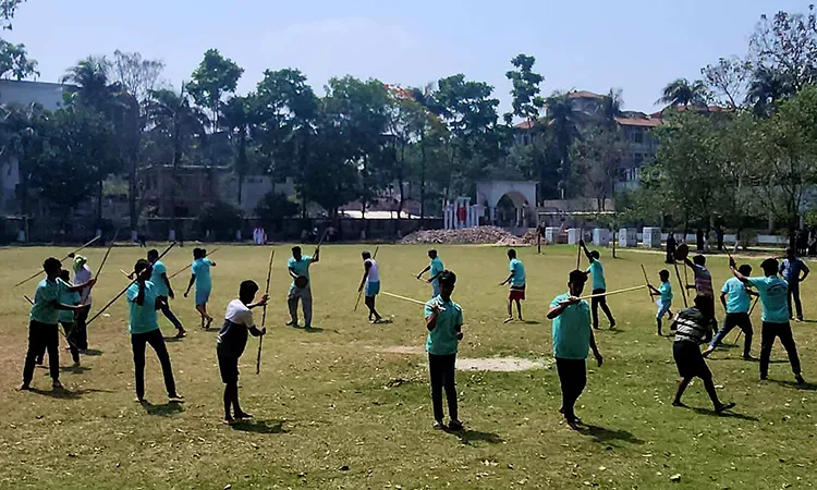 Traditional Lathi Khela and Processions Mark New Year in Bheramara