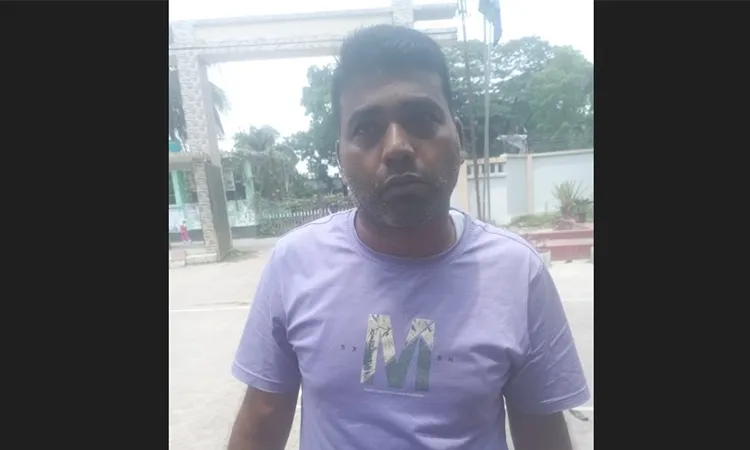 Md. Badal Hossain a member of Nachanmahal Union Parishad arrested on April 14, 2026.,