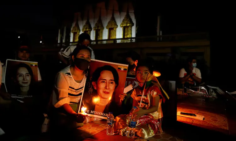 Myanmar Reduces Aung San Suu Kyi's Sentence and Frees Ex-President
