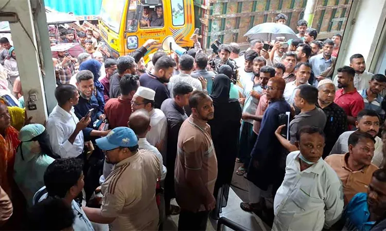 Protesters locked the Union Bank branch in Khatunganj at approximately 12:00 PM on May 3, 2026.