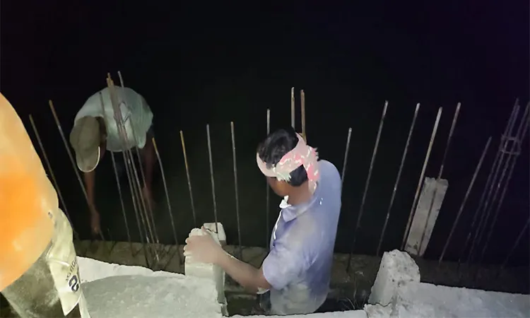Municipality project casting work continues in darkness without supervision in Paikgachha