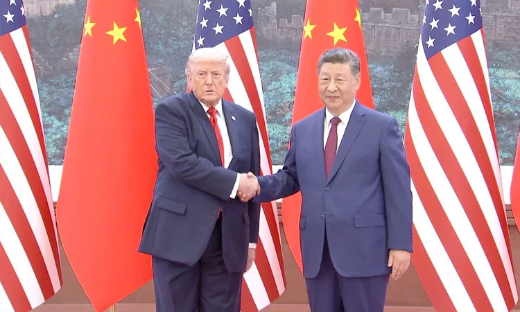 Xi Jinping, Donald Trump shake hands and pose for photo in Beijing.