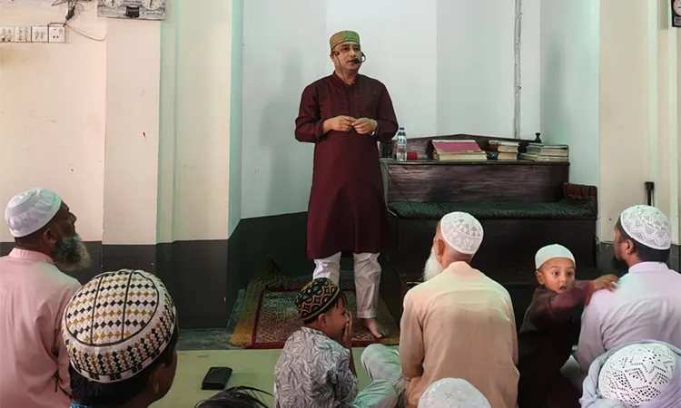 Mohanganj Police Station Officer-in-Charge (Hafizul Islam Harun) addressed congregants at Markus Mosque.