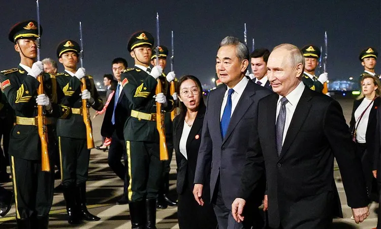 Chinese Foreign Minister Wang Yi and Russian President Vladimir Putin.