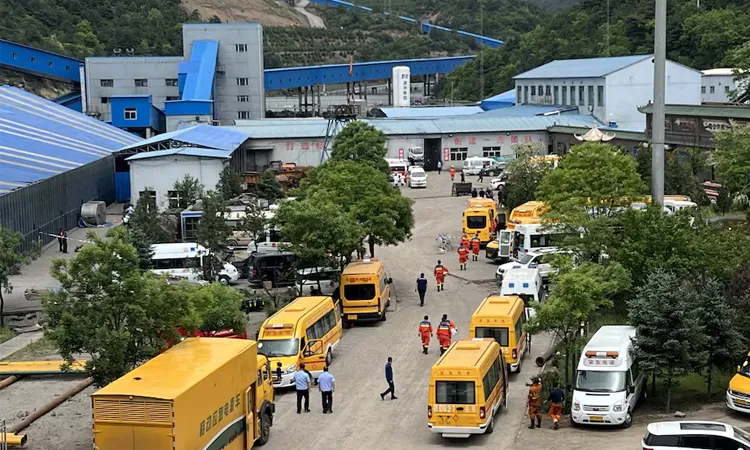 Rescuers work at the site following a gas explosion at Liushenyu coal mine in Qinyuan county, Shanxi province, China