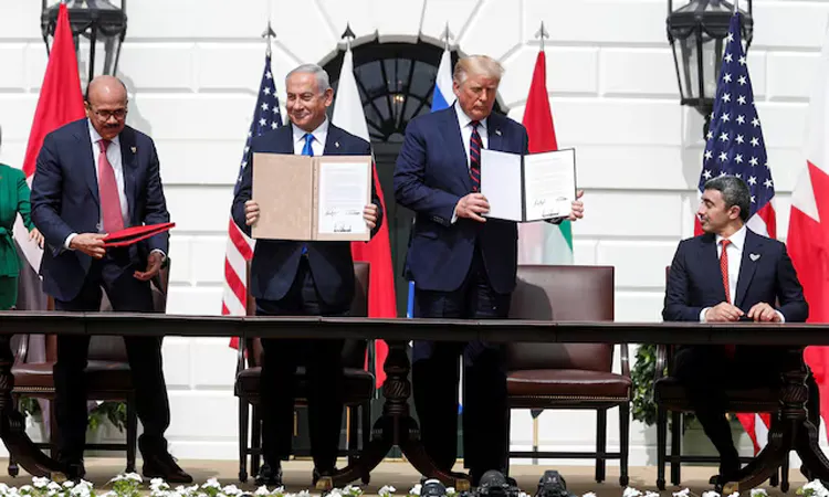 Bahrain's Foreign Minister Abdullatif Al Zayani, Israel's Prime Minister Benjamin Netanyahu, U.S. President Donald Trump and United Arab Emirates (UAE) Foreign Minister Abdullah bin Zayed participate in the signing of the Abraham Accords, normalizing relations between Israel and some of its Middle East neighbors in a strategic.