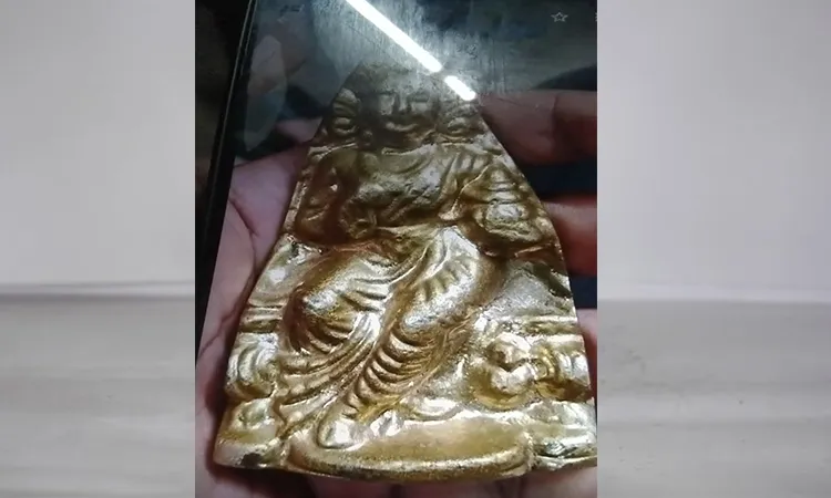 Police recovered a golden-colored idol weighing around 500 grams.