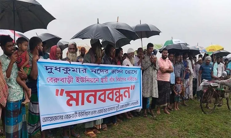 Locals Demand Permanent Dam to Stop Dudhkumar River Erosion
