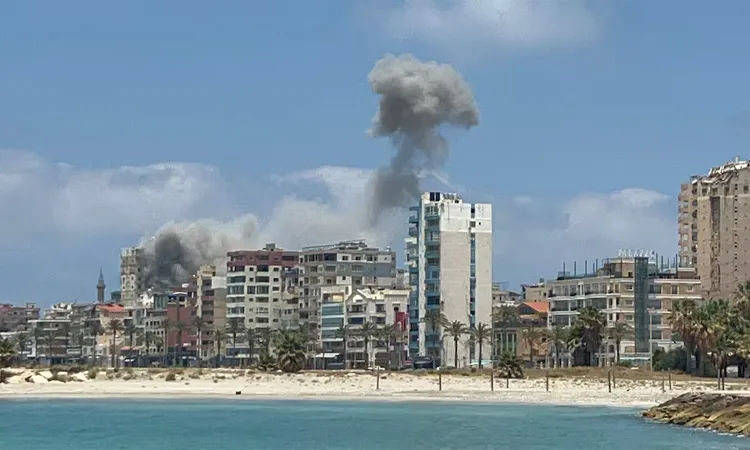Smoke billows following an Israeli strike in Tyre, Lebanon.