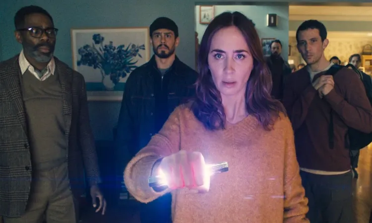 This image released by Universal Pictures shows Colman Domingo, from left, Tommy Martinez, Emily Blunt and Josh O’Connor in a scene from “Disclosure Day”.