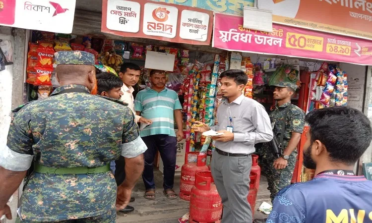 The drive was conducted on Tuesday near the gate of S.M. Model School under the supervision of Assistant Commissioner and Executive Magistrate A.K.M. Faizul Bari.