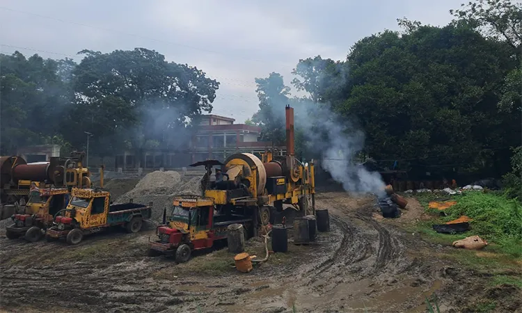 A bitumen-burning plant operating directly outside Keshabnagar Primary School in Faridpur.