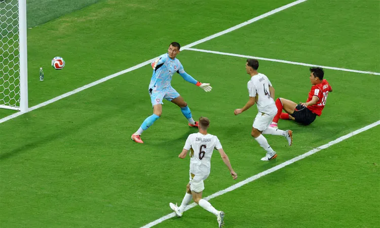South Korea's Oh Hyeon-gyu scores their second goal.