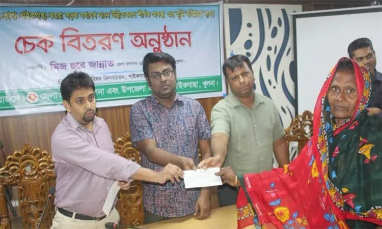Land Compensation Cheques Distributed in Paikgachha