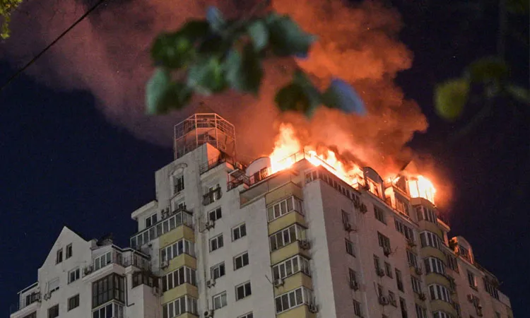 An apartment building burning after a Russian missile attack in Kyiv, Ukraine.