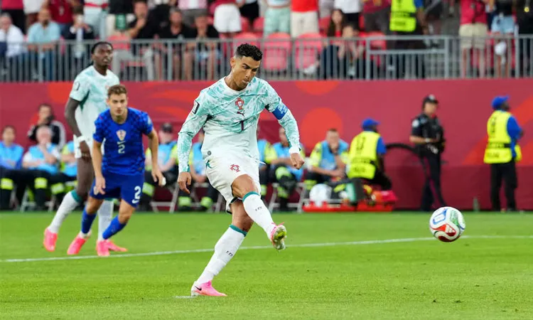 Cristiano Ronaldo scores their first goal from the penalty spot