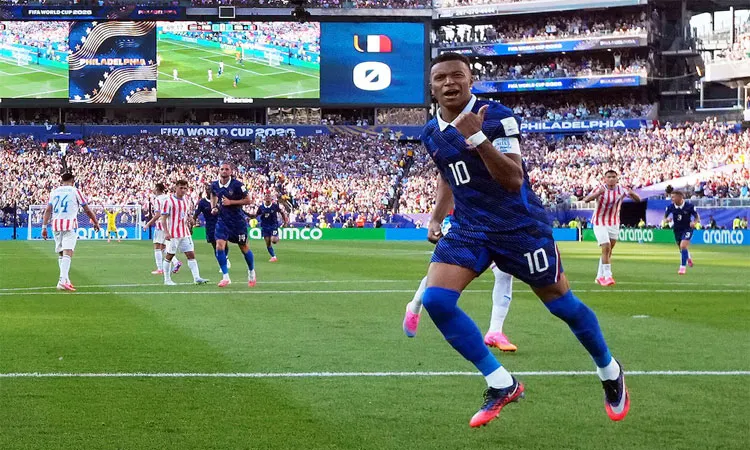 France's Kylian Mbappe celebrates scoring the goal a second-half penalty.