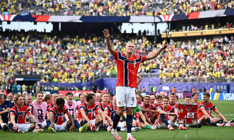 Norway's Erling Haaland with teammates celebrate after the match as Norway qualify for the quarter finals of the World Cup.