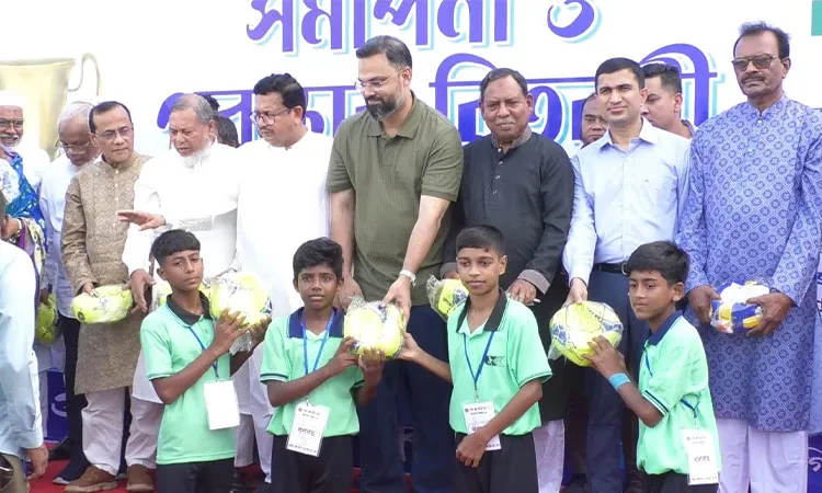 Md. Aminul Haque attending as the chief guest at the final match of the Deputy Commissioner Gold Cup Football Tournament in Pabna.