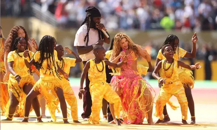 Shakira and Burna Boy perform during the Topps Final Halftime Show the FIFA World Cup 2026 Final match between Spain and Argentina at New York New Jersey Stadium.