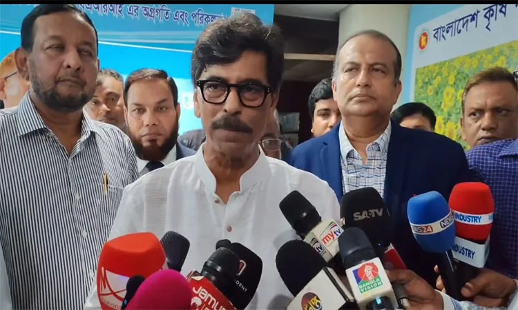Agriculture Minister Mohammad Amin Ur Rashid speaking to journalists at BARI.