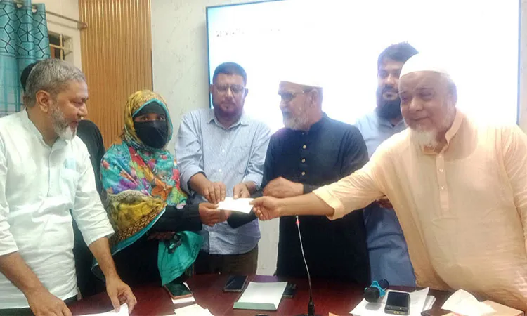 Porsha Upazila administration distributed financial assistance cheques to sick and destitute individuals.