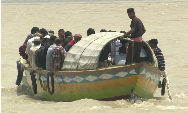 Illegal ferry boats collecting unauthorized tolls continue operating on the Padma River in Nazirganj, Pabna.