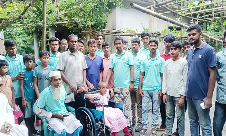 Al Khidmah Foundation distributed wheelchairs to a disabled child.