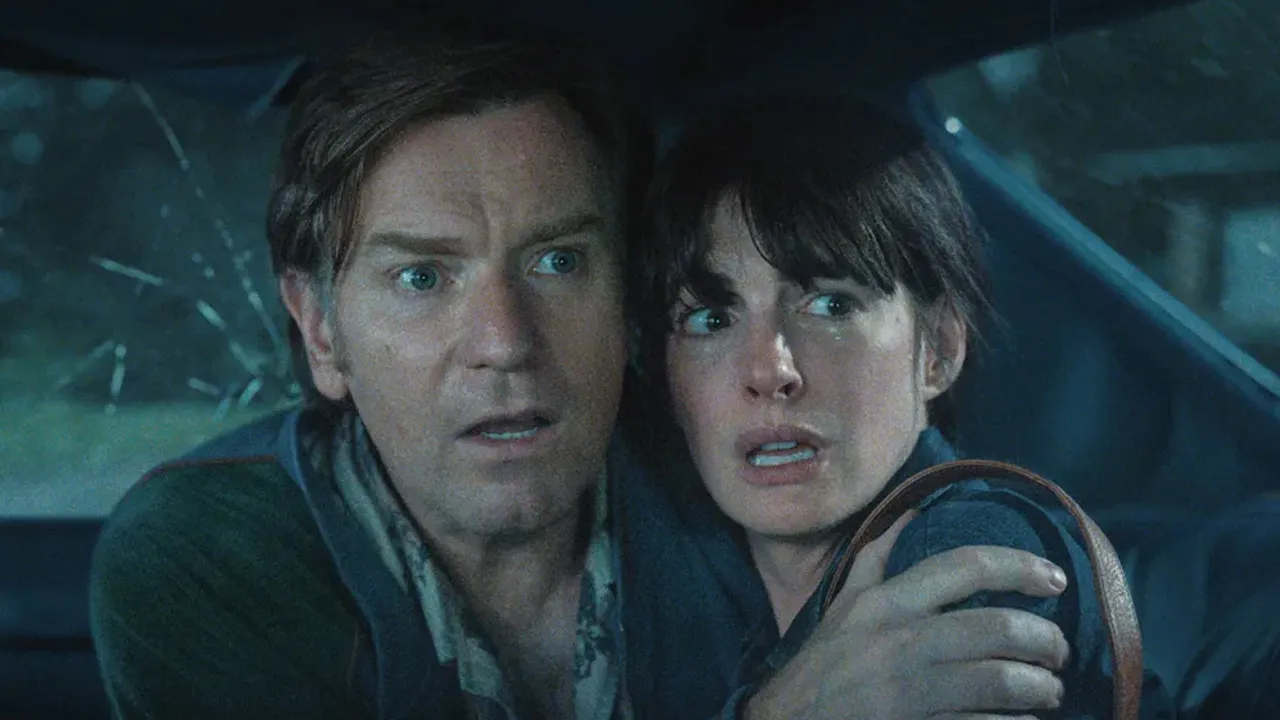Ewan McGregor (left) and Anne Hathaway in 'The End of Oak Street.' Courtesy Warner Bros. Pictures